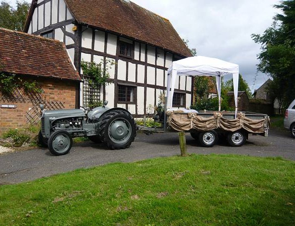 Vintage tractor wedding transport